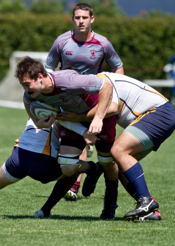 LMU club sport Rugby team on the field.