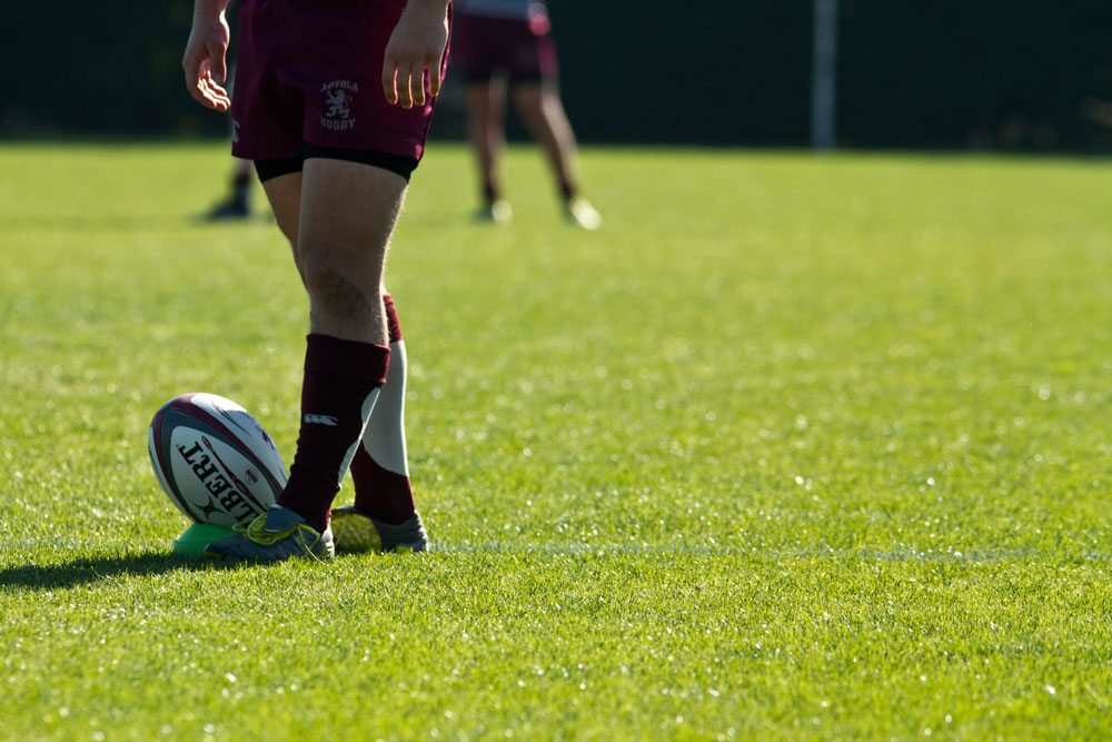 LMU club sport Rugby team on the field.