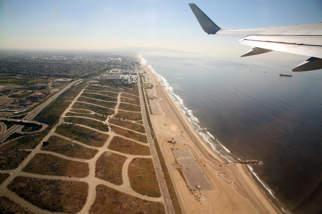Aerial shot, taken from a departing airplane, of the Surfridge ghost town in Los Angeles.